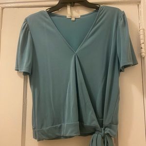 Green envelope blue blouse
